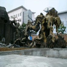 工厂定做仿真桃花樱花假树 灵寿商场与房产园区的水泥假树装饰新潮流