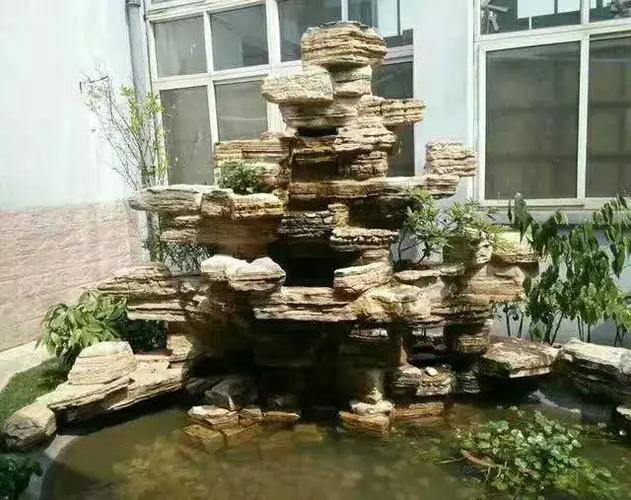 庭院假山设计制作 千层石与水景的诗意交融